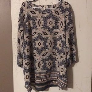 Dressy top with slits on arms